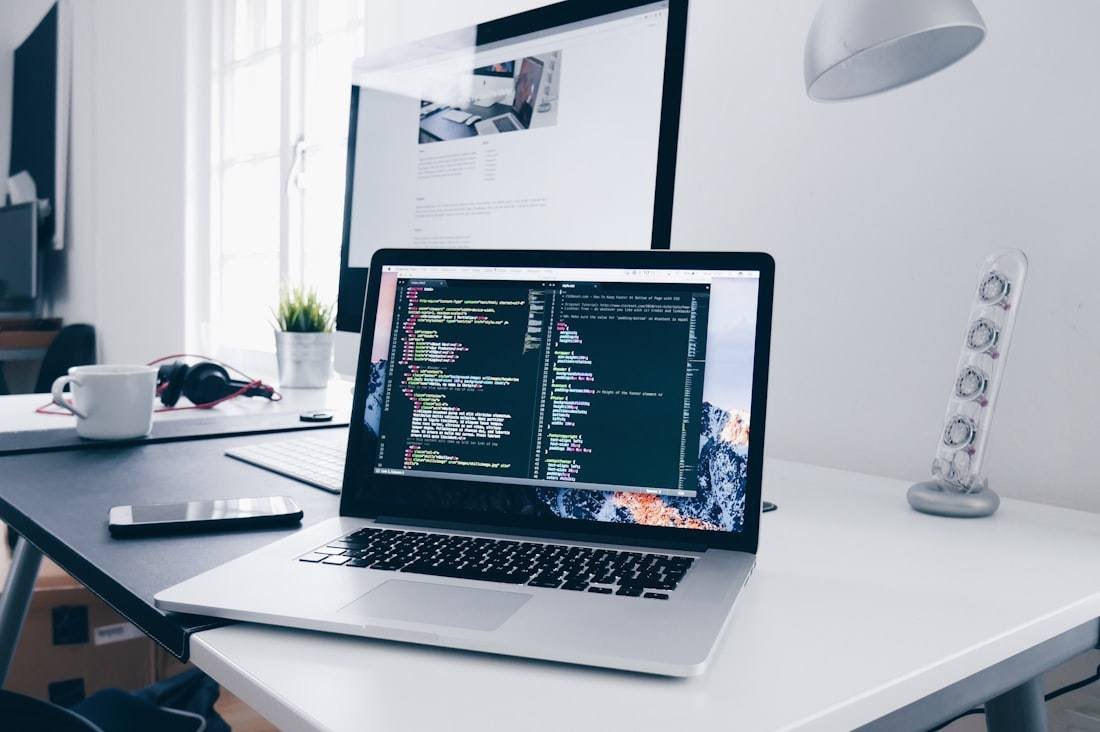 Laptop and monitor on a home desk