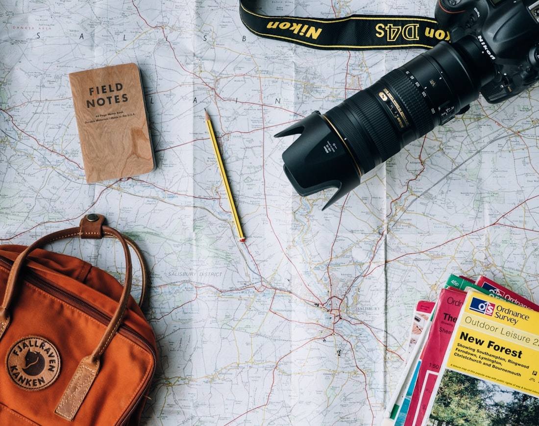 Travel flatlay with a phone connected internationally